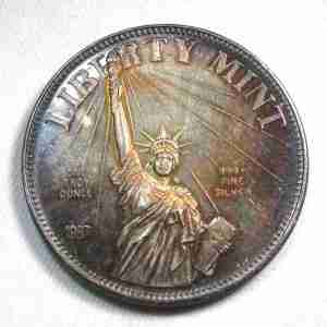 1987 Liberty Mint .999 Silver 1 Ounce Round Rainbow Toned AU408